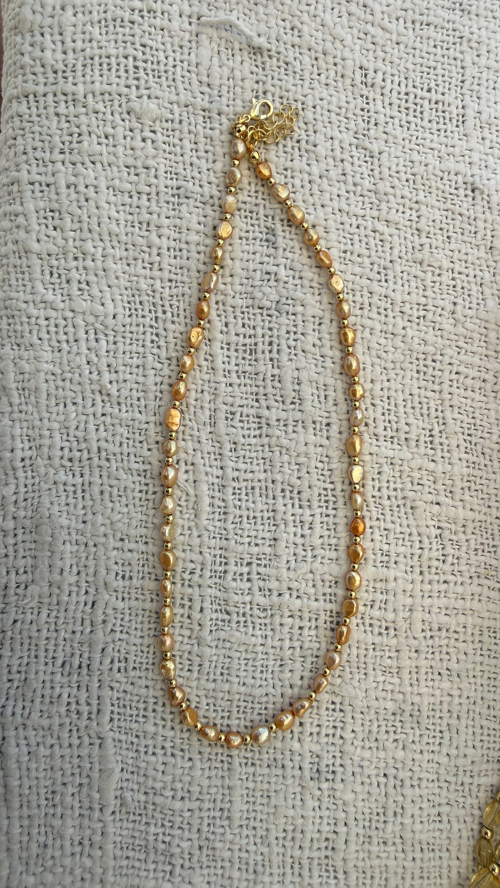 Peach pearl necklace
