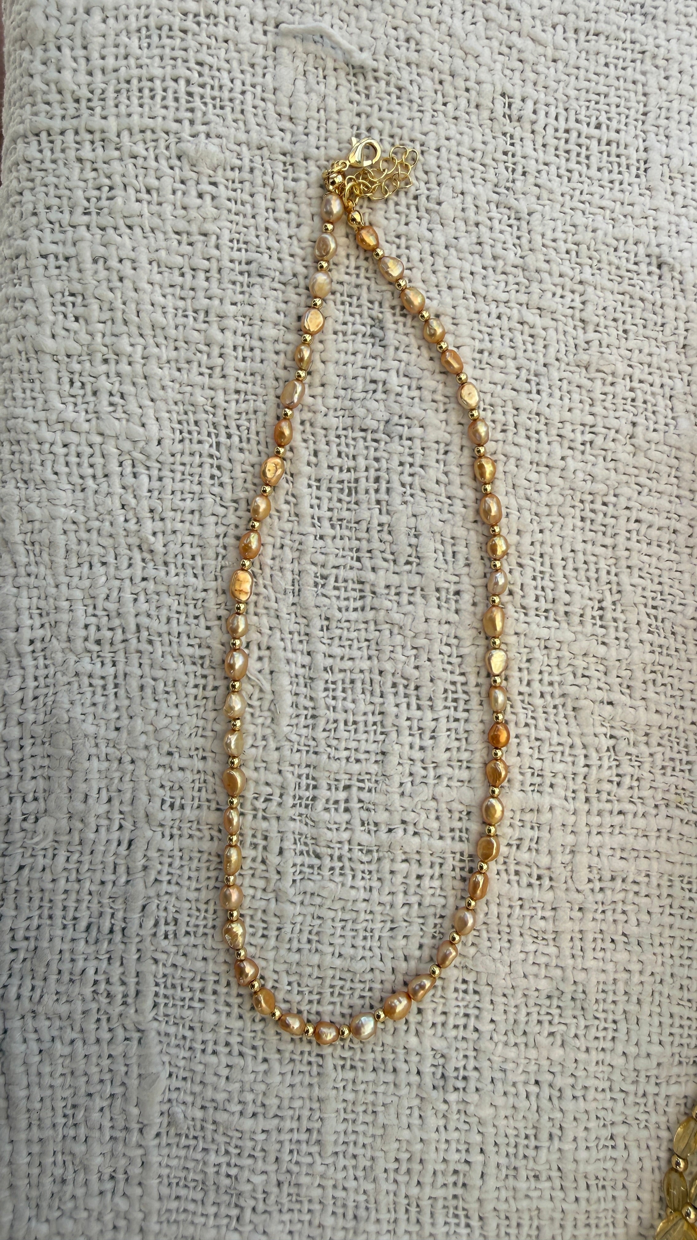Peach pearl necklace