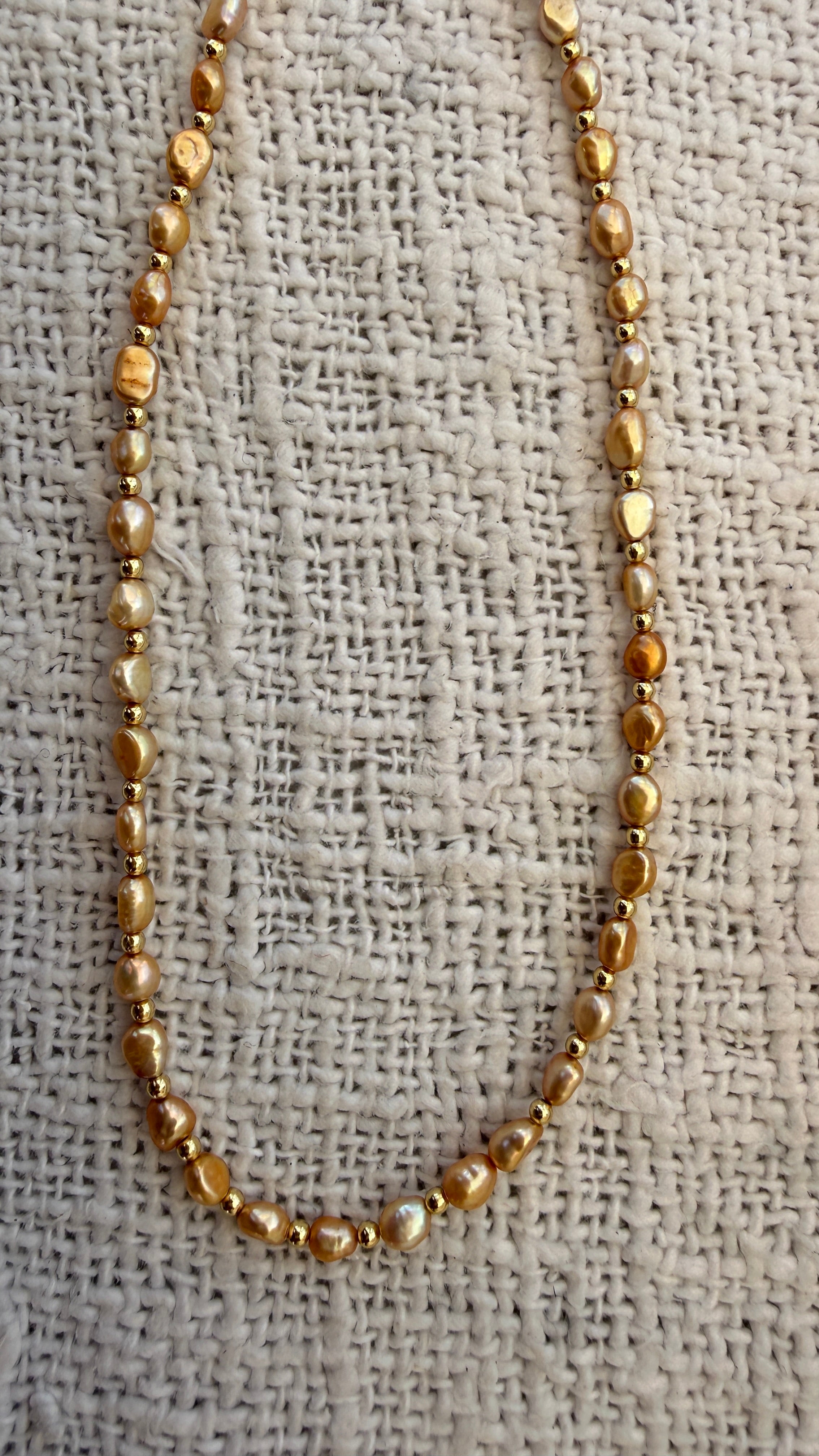 Peach pearl necklace