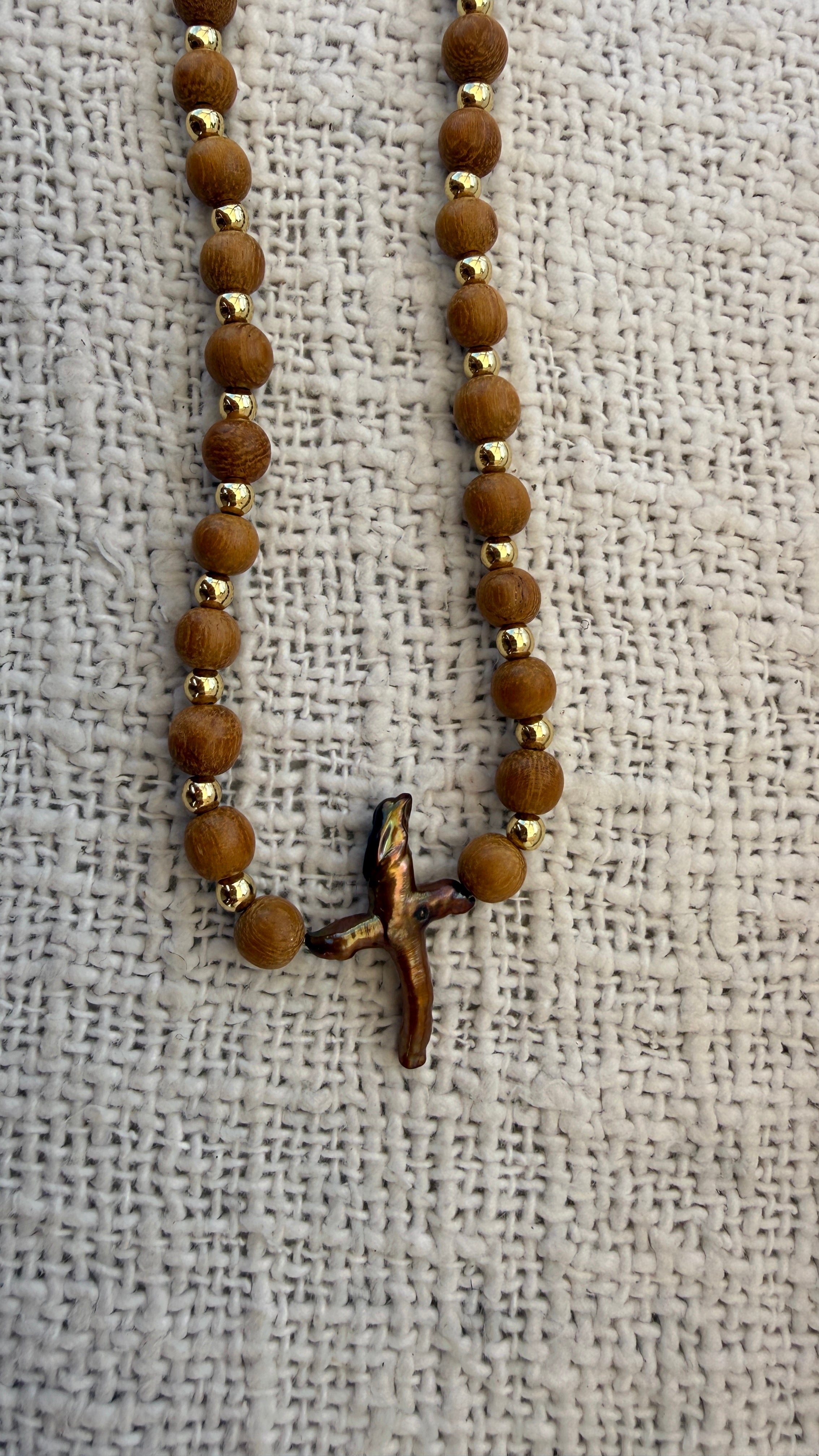 brown cross necklace