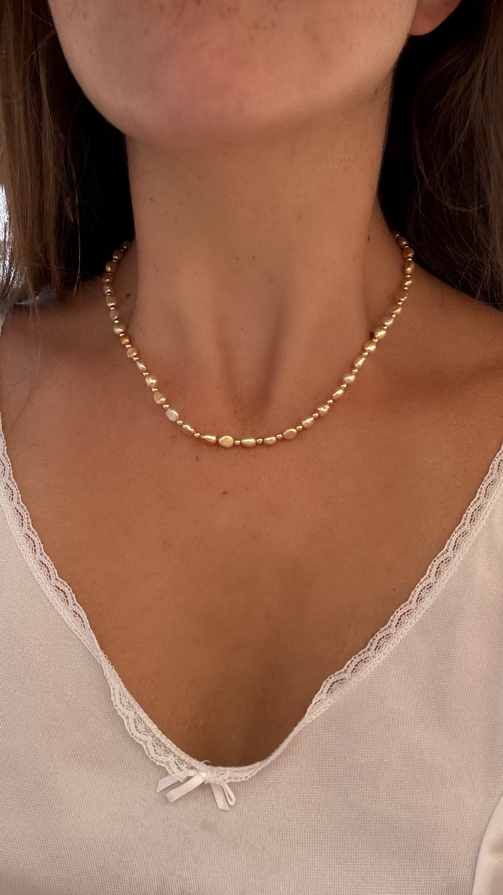 Peach pearl necklace