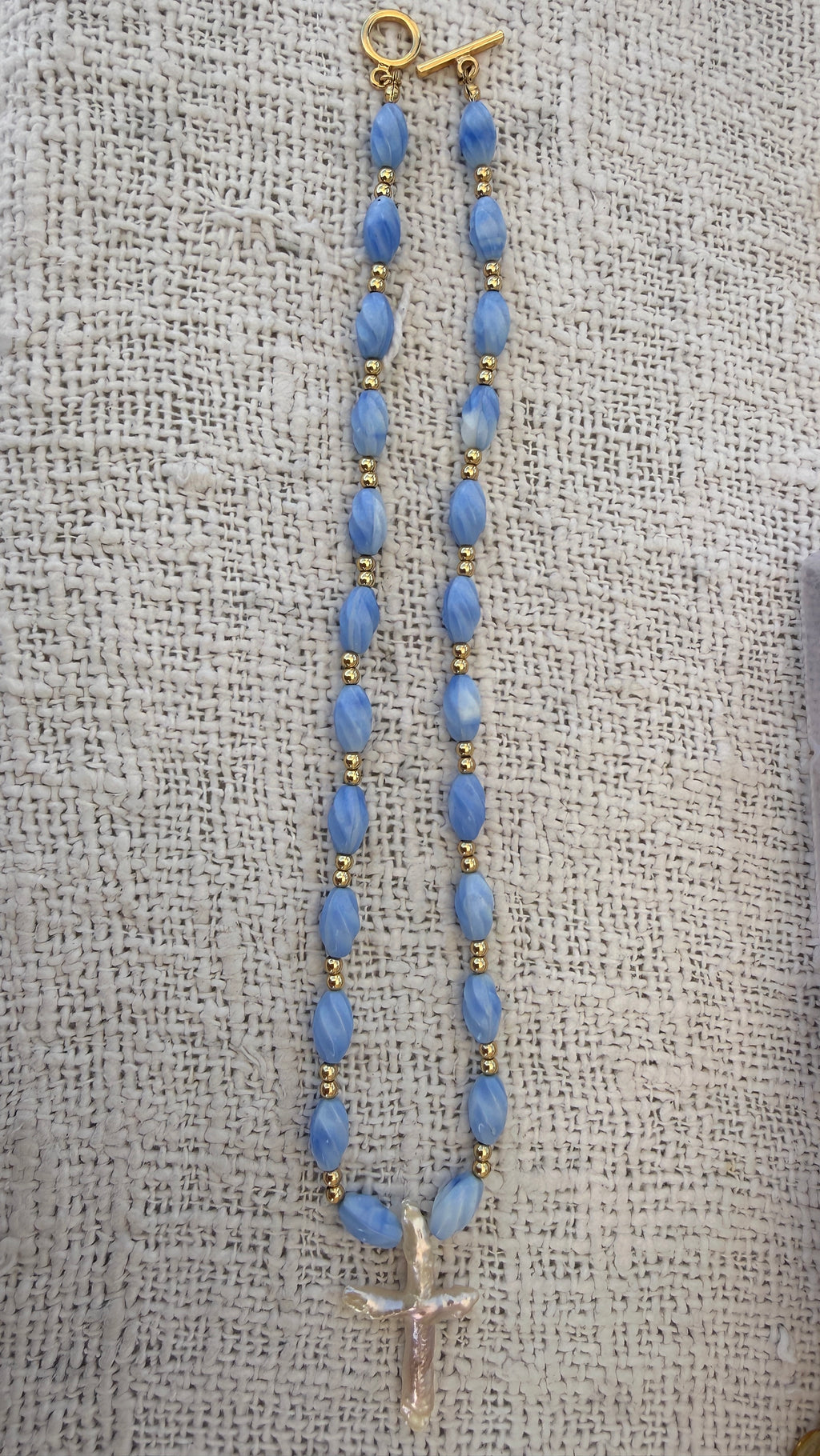 Blue pearl cross necklace